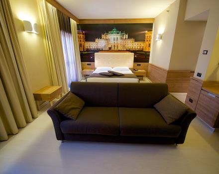 Comfort and elegance in the Family Rooms of our hotel 3 stars in Torino