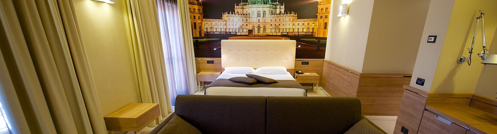 Comfort and elegance in the Family Rooms of our hotel 4 stars in Torino